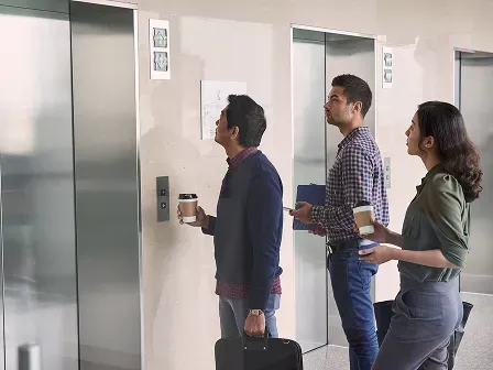 Body image showing non-disabled people waiting for an elevator