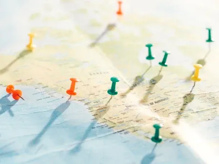US map with pins representing address to coordinates conversion