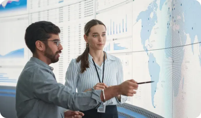 Data analysts viewing a map