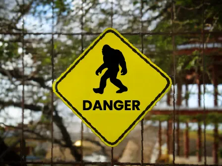 warning sign with image of sasquatch